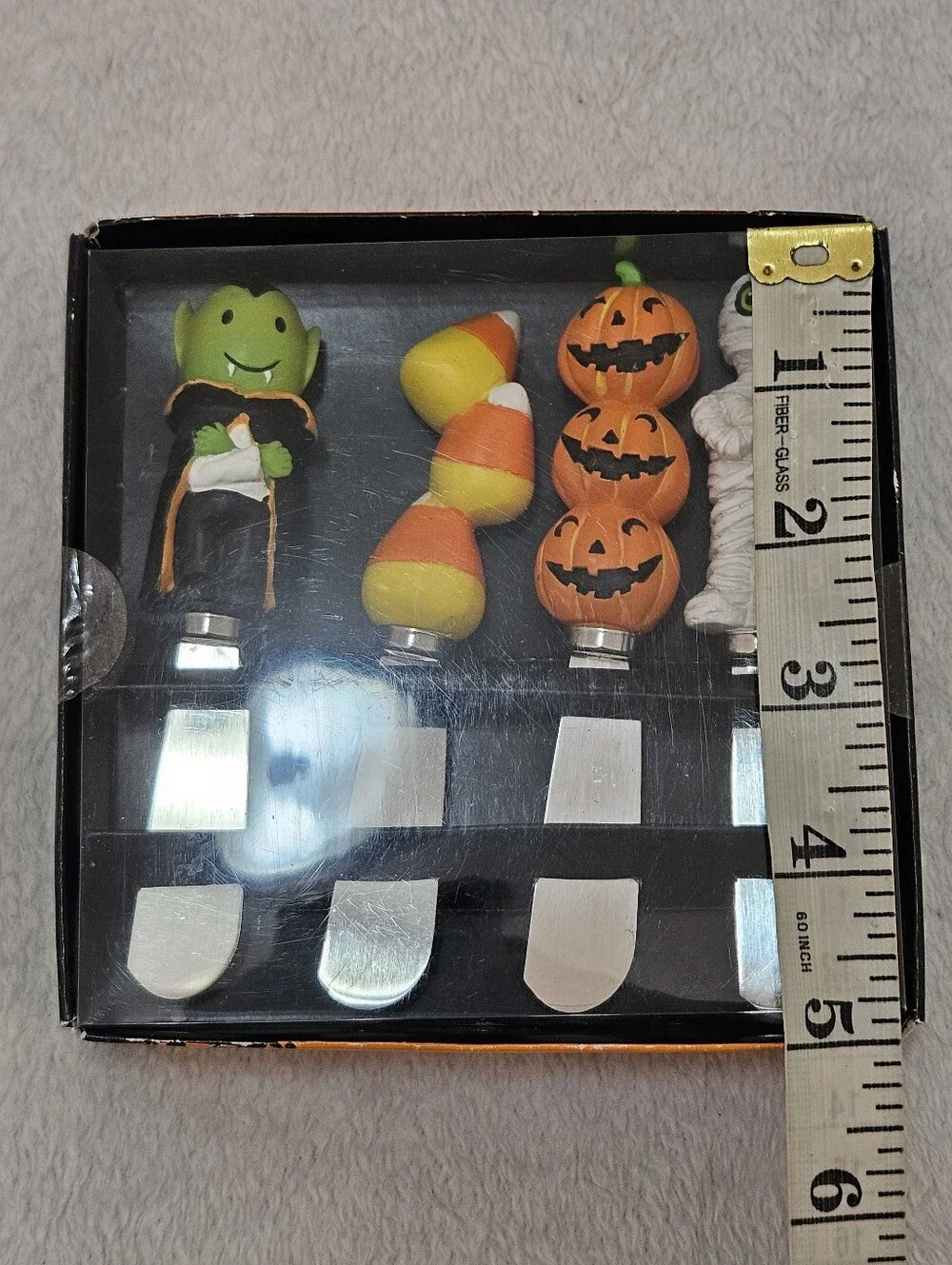 The Pier 1 Imports Halloween Canape Knife Set (4) featuring a spooky Halloween